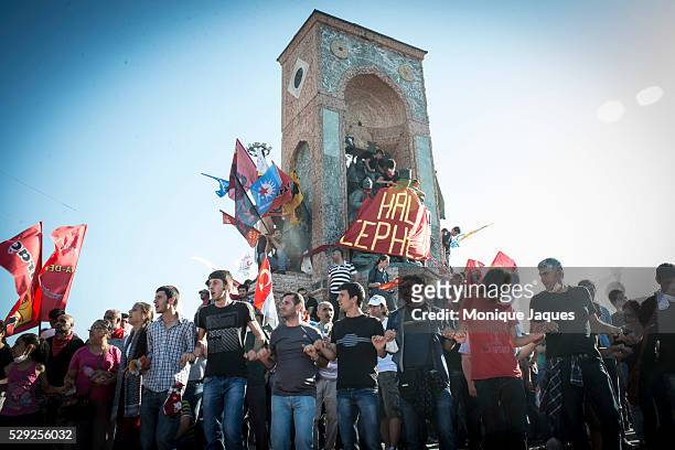 After leaving the square, Turkish protestors flod in and celebrate reclaiming the square. Protests in Istanbul, Turkey continue. Protests began as a...