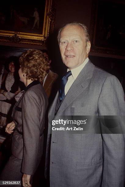 Gerald Ford with Betty Ford in the background; circa 1970; New York.