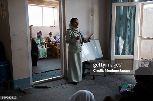 Girls learn to read and write at a Pashtun vocational school in Kabul, Afghanistan. The school is run as a vocational school, billed as a place for...