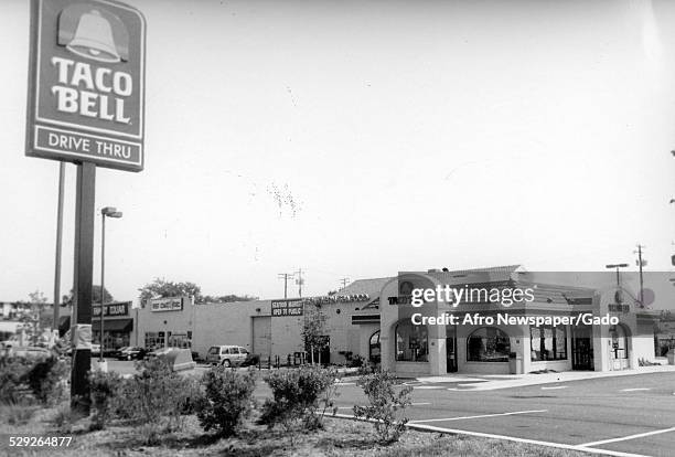 Street signs at a Taco Bell restaurant, July 16, 1994.