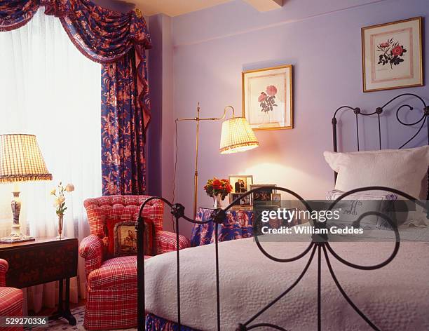 view of a comfortably-furnished bedroom - ferro battuto foto e immagini stock