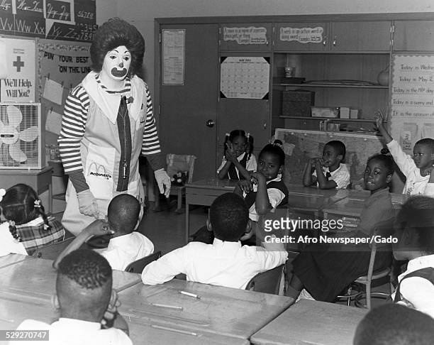 Ronald McDonald at an elementary school Original Caption Reads: 'Ronald Mcdonald Gives A Safety Lesson At Grove Park Elementary School To Mrs...