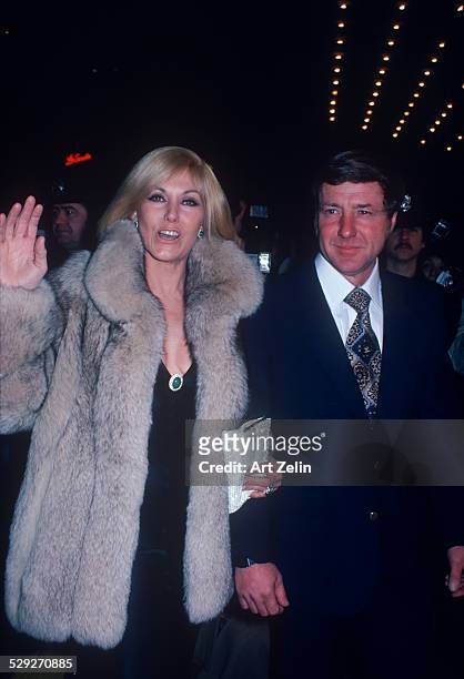 American actress Kim Novak and her husband, Robert Malloy, attend the premiere party for 'The Mirror Crack'd' at the Waldorf Hotel in New York City,...