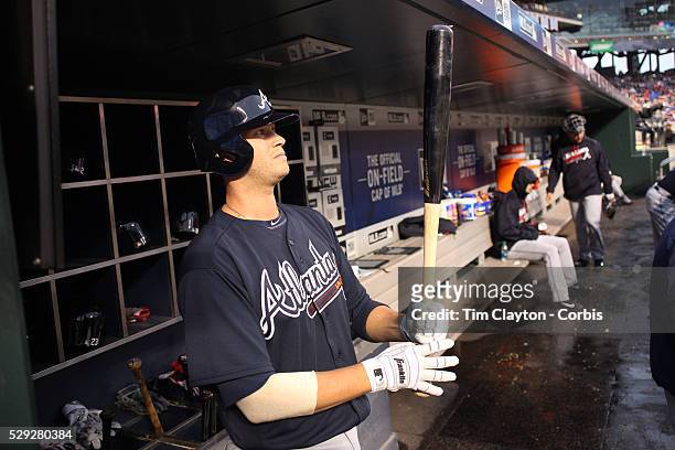Reid Brignac of the Atlanta Braves, preparing to bat in the dugout during the Atlanta Braves Vs New York Mets MLB regular season game at Citi Field...