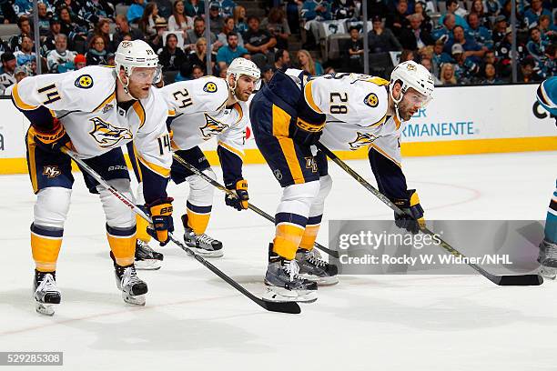 Mattias Ekholm, Eric Nystrom and Paul Gaustad of the Nashville Predators face off against the San Jose Sharks in Game One of the Western Conference...