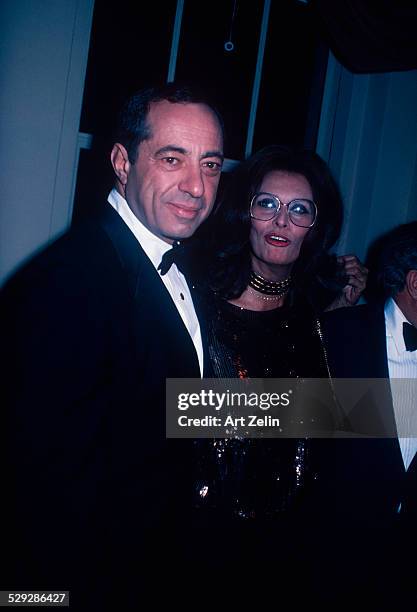 Sophia Loren with Mario Cuomo at a formal event; circa 1970; New York.