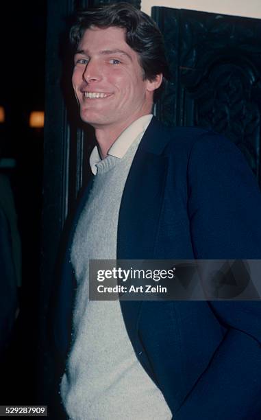 Christopher Reeve wearing a gray sweater and blue jacket; circa 1970; New York.