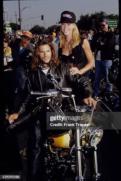 Lorenzo Lamas and wife Kathleen Kinmont, also both stars of the syndicated television show "Renegade", participate in the annual "Love Ride" of...