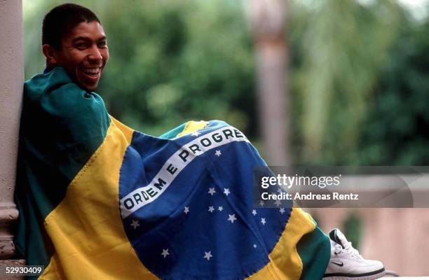 Nationalmannschaft BRASILIEN Miami; Giovane ELBER mit brasilianischer Flagge/
