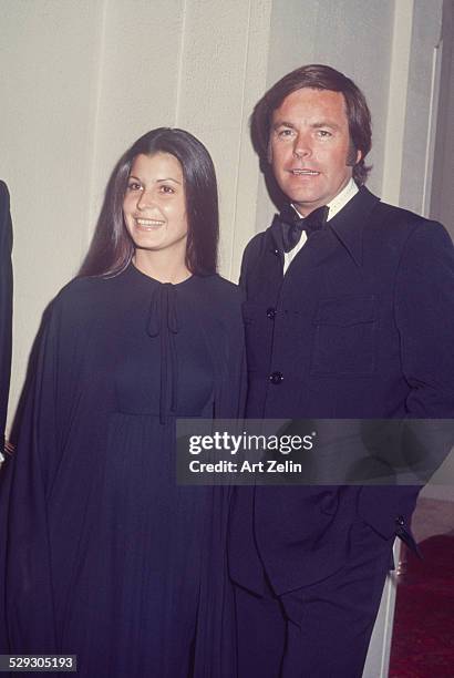 Robert Wagner with Tina Sinatra at a formal event, when they were dating; circa 1970; New York.