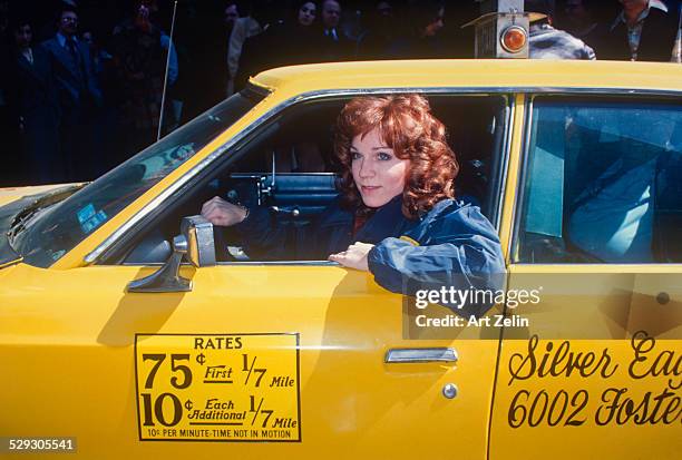Marilu Henner in a taxi promoting the show Taxi; circa 1970; New York.