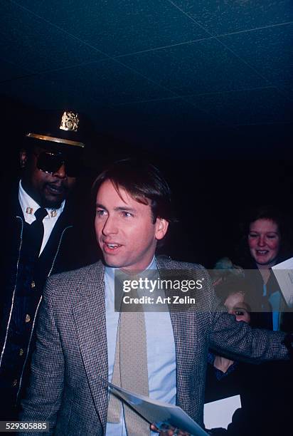 John Ritter with autograph hounds and security; circa 1970; New York.