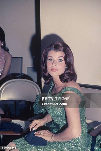 Senta Berger wearing a green semi-formal dress; circa 1970; New York.