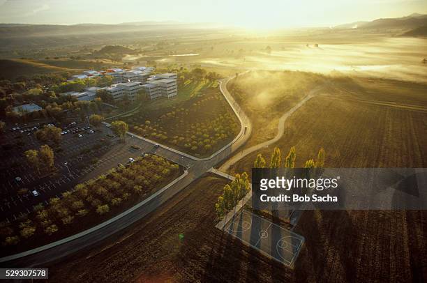 ibm research lab (top left) adjacent to agricultural land - silicon valley ストックフォトと画像