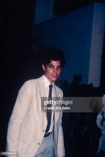 Ralph Macchio in a jacket and tie; circa 1970; New York.