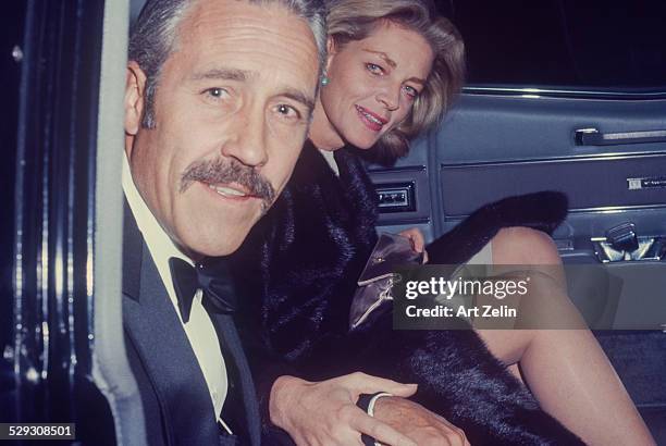 Jason Robards Lauren Bacall going to a broadway show; circa 1970; New York.