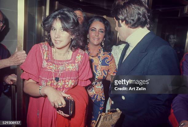 Elizabeth Taylor with her daughter; Maria Burton; at a formal event; circa 1970; New York.