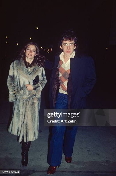 Steven Spielberg with his wife Amy Irving she is wearing a fur coat; circa 1970; New York.