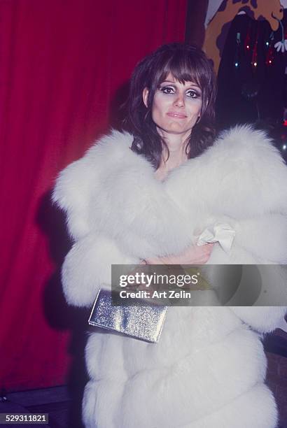 Paula Prentiss in fur coat outside event; circa 1970; New York.