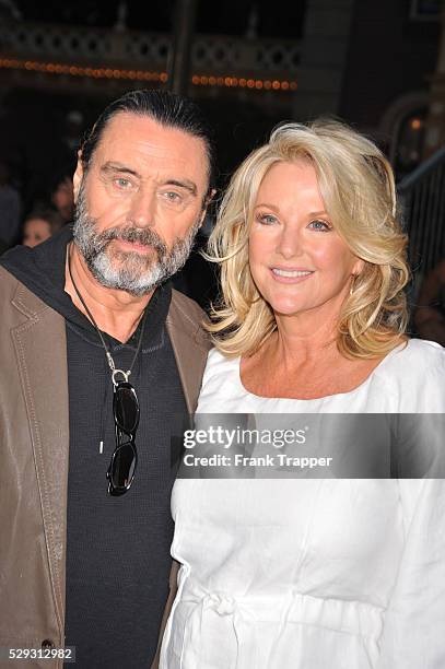 Actor Ian McShane and guest arrive at the World Premiere of Walt Disney Pictures' "Pirates of the Caribbean: On Stranger Tides" held at Disneyland in...
