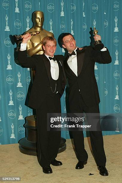 Matt Damon and Ben Affleck, Oscar for best original scenario for the movie 'Good Will Hunting'.