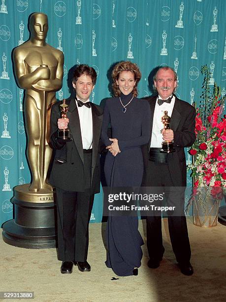 James Horner, composer, Celine Dion & Wilbur Jennings, lyricist with the Oscars for 'Titanic'.