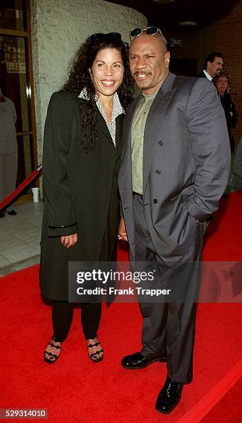 Ving Rhames and his wife Valerie arrive at the Mann's National Theater.