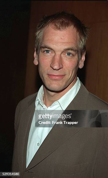 Julian Sands arrives at the charity premiere.
