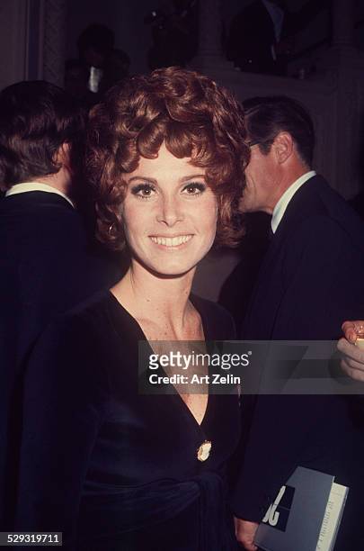 Stefanie Powers in a black evening dress at a formal event; circa 1970; New York.