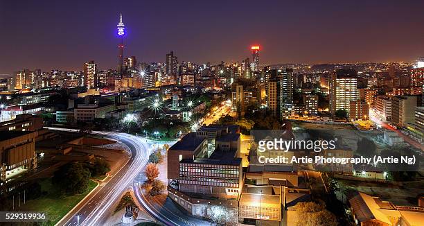 view of hillbrow tower & city skyline, johannesburg, gauteng province, south africa - gauteng province stock pictures, royalty-free photos & images