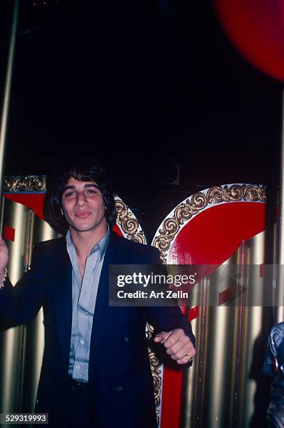 Tony Danza on a carousel; circa 1970; New York.