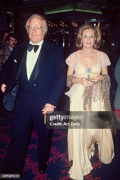 Barbara Walters wearing pink with Roone Arledge at a formal event; circa 1970; New York.