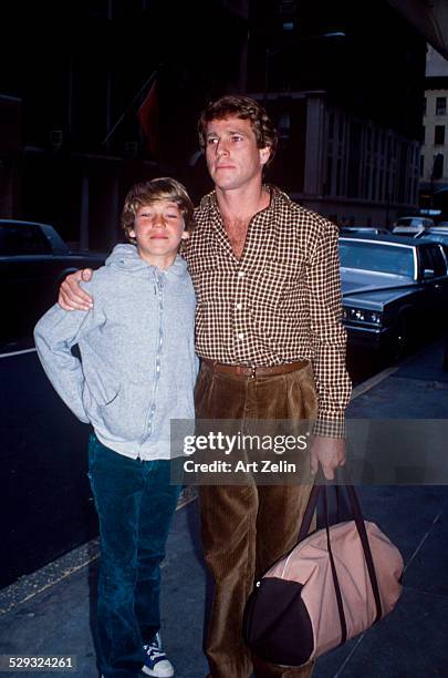 Ryan O'Neal with his son Griffin O'Neal; circa 1970; New York.