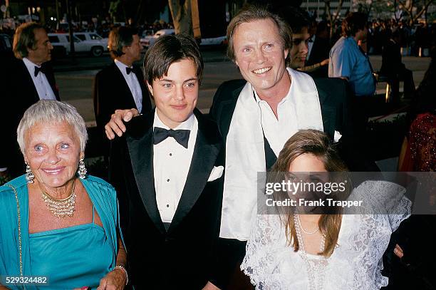 Actor Jon Voight with son James Haven, daughter Angelina Jolie, and mother Barbara Kamp, arrive at the 1986 Academy Awards��. This photo appears on...