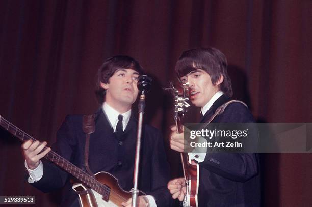 George Harrison, Paul McCartney; circa 1970; New York.