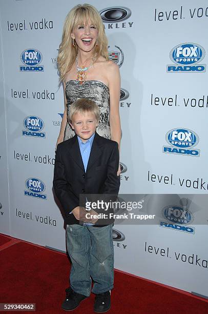 Actress Katryn Morris and actor Dakota Goyo arrive at the premiere of "Resurrecting The Champ" held at the Academy of Motion Picture Arts & Sciences...