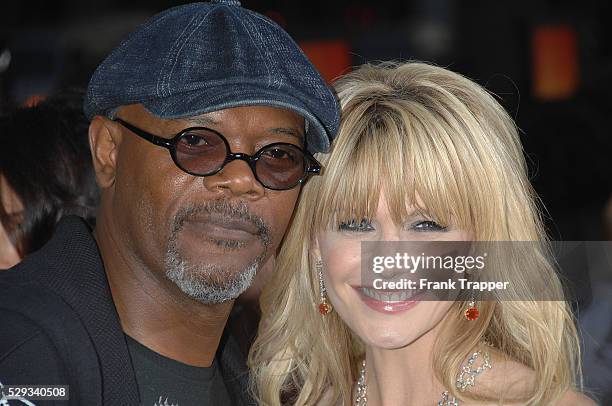 Actress Kathryn Morris and actor Samuel L. Jackson arrive at the premiere of "Resurrecting The Champ" held at the Academy of Motion Picture Arts &...