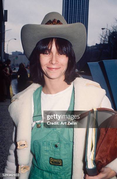 Kate Jackson in overalls shearling jacket and Stetson; circa 1970; New York.