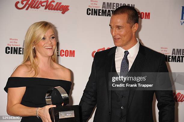 Actors Matthew McConaughey and Reese Witherspoon pose with her 29th American Cinematheque Award, at the Hyatt Regency Century Plaza.