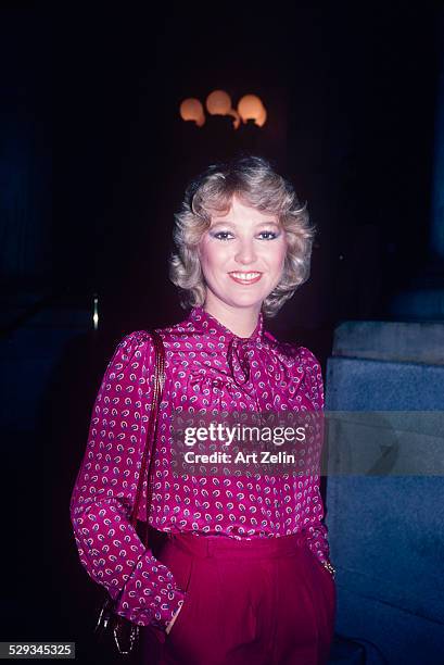 Tanya Tucker in a fuchsia paisley blouse; circa 1970; New York.