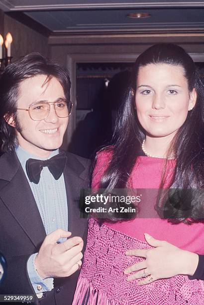 Lucie Arnaz with Phil Rappaport. She is wearing pink beaded poncho; circa 1970; New York.