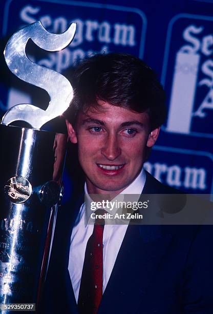 Wayne Gretsky close-up with trophy; circa 1970; New York.