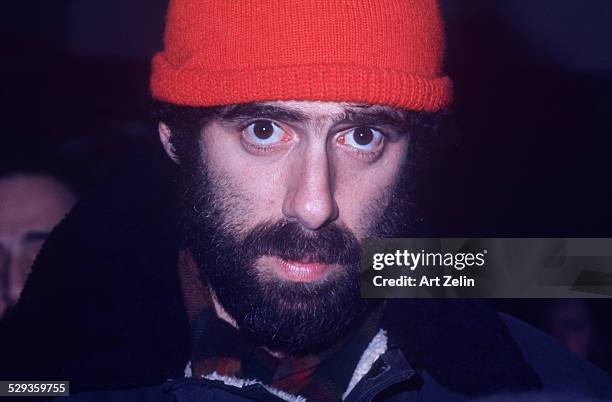 Elliott Gould in knit cap and beard looking into camera; circa 1970; New York.