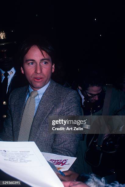 John Ritter signing autographs; circa 1970; New York.