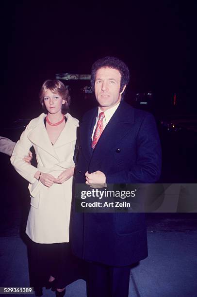 James Caan with his wife Sheila on the street in winter coats; circa 1970; New York.