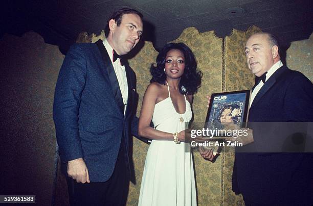 Singer Diana Ross was presented the Entertainer of the Year award by Cue Magazine Jan. 12. 1973..