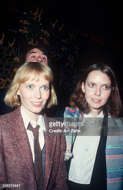 Tisa Farrow with her sister Mia Farrow. Mia is wearing a red tweed jacket; circa 1970; New York.
