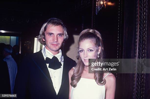 Terence Stamp with Joanna Pettet at a formal event; circa 1970; New York.