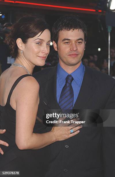 Carrie-Anne Moss and husband Steven Roy arriving at the premiere of "The Matrix Reloaded."