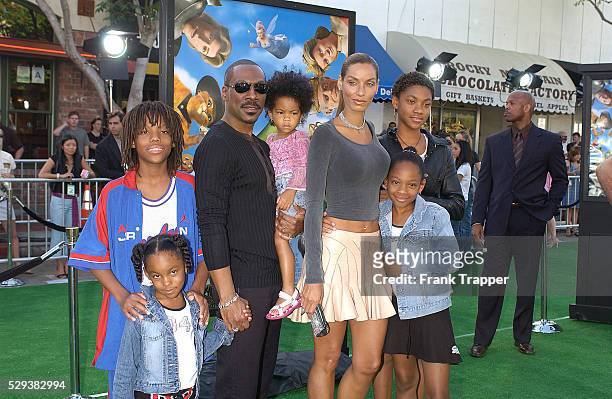Actor Eddie Murphy and his wife Nicole arrive with their children at the premiere of the computer-animated comedy "Shrek 2."
